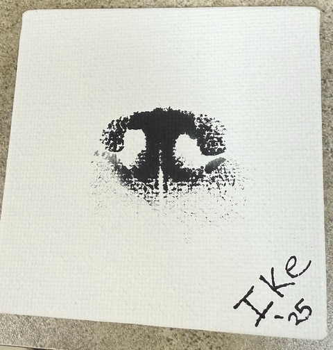 White textured memorial canvas featuring a black ink nose print and the personalized name “Ike ’25” in Atlanta, GA.